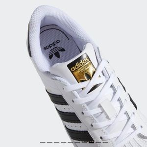 Adidas shell toe sneakers (White and Black stripes)